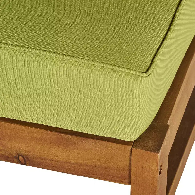 Set divano angolare a 6 posti e poltrona da conversazione GDFStudio Abena per esterni in legno di acacia con cuscini