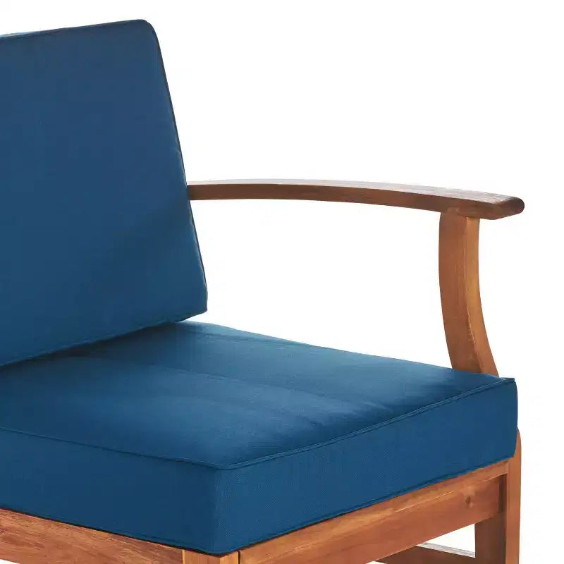 Set divano angolare a 6 posti e poltrona da conversazione GDFStudio Abena per esterni in legno di acacia con cuscini