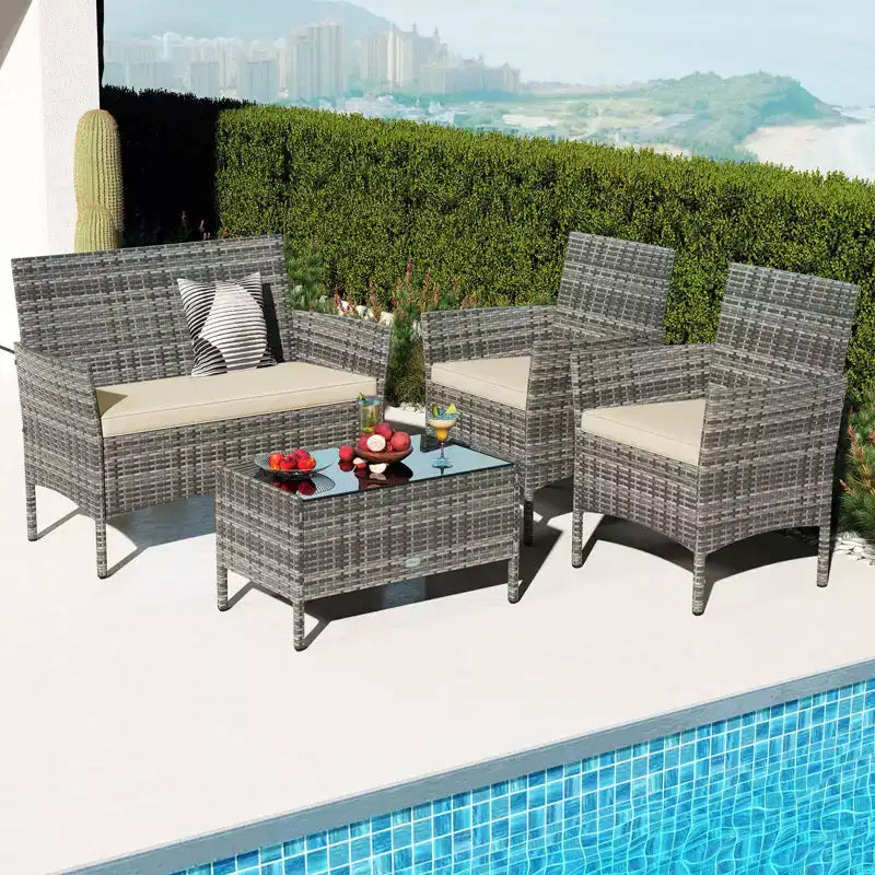 Costway Set di 4 Mobili da Giardino con Cuscini Lavabili e Tavolino da Caffè con Piano in Vetro Temperato Grigio