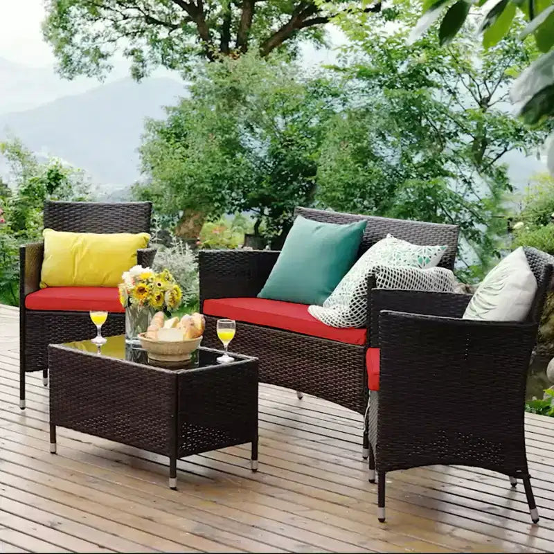 Set Mobili da Giardino 4 Pezzi in Rattan con Tavolo Scaffale Divano e Cuscini Turchese/Rosso/Grigio Costway