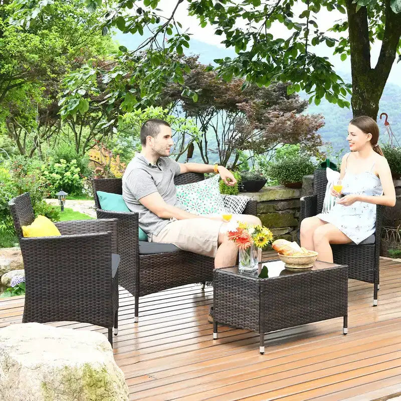 Set Mobili da Giardino 4 Pezzi in Rattan con Tavolo Scaffale Divano e Cuscini Turchese/Rosso/Grigio Costway