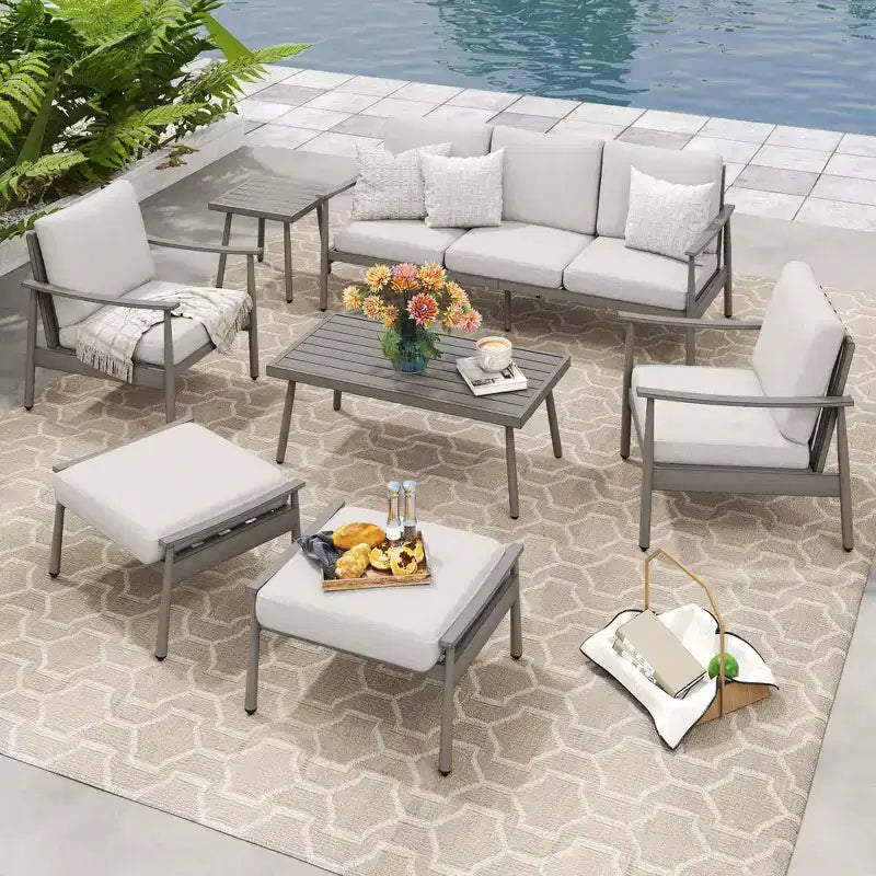 HAPPATIO Set Conversazione da Esterno in Alluminio 7 Pezzi Include 1 Divano a Tre Posti, 1 Tavolino da Caffè, 1 Tavolino Laterale, 2 Poltrone e 2 Pouf/Ottoman