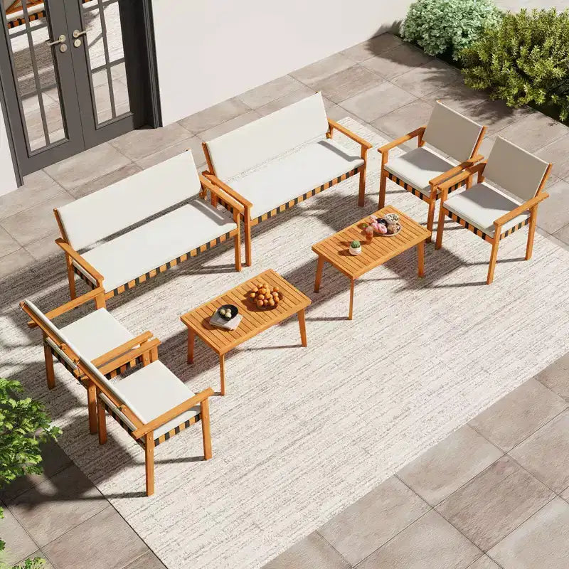 Set di mobili da esterno Costway 4 pezzi in legno con tavolino e cuscini per schienale per giardino e veranda