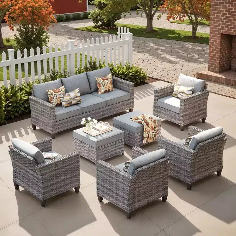 Set sezionale da esterno in rattan a 7 pezzi HOMLUX con divano + poggiapiedi + sedie