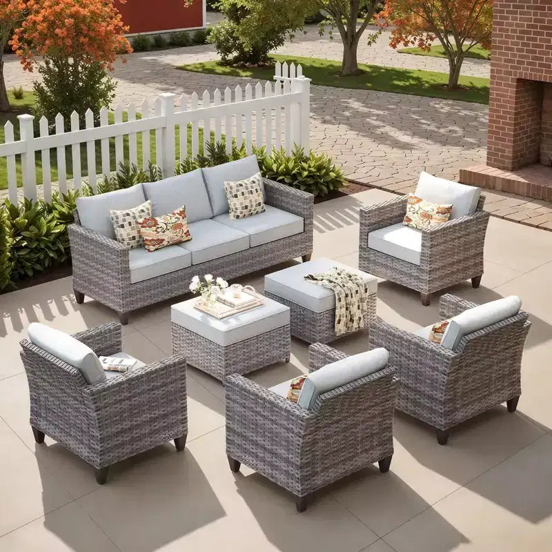 Set sezionale da esterno in rattan a 7 pezzi HOMLUX con divano + poggiapiedi + sedie