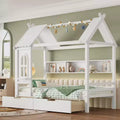 Letto a piattaforma a forma di casetta con cassetti contenitore e finestra, struttura in legno massello con ripiani, design giocoso per bambini, bianco chiaro
