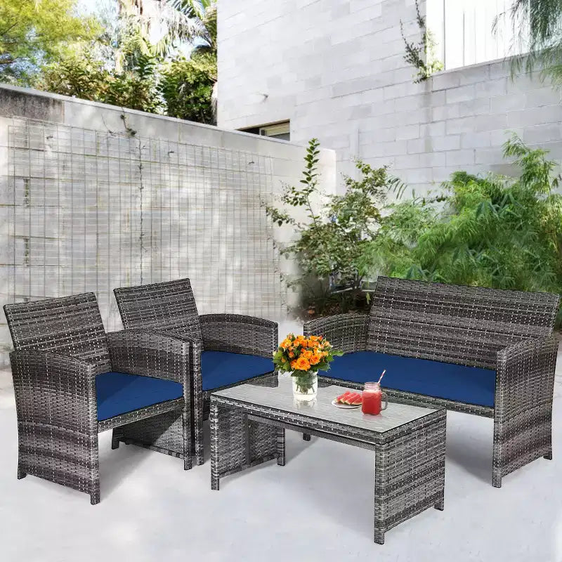 Costway Set Divani da Esterno 4 Pezzi in Rattan Tavolino Vetro con Cuscini Turchese/Rosso/Grigio/Beige/Blu Scuro/Nero