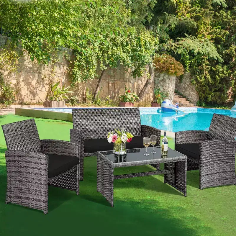 Costway Set Divani da Esterno 4 Pezzi in Rattan Tavolino Vetro con Cuscini Turchese/Rosso/Grigio/Beige/Blu Scuro/Nero