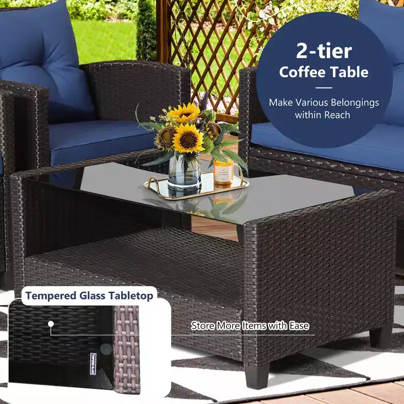 Set di mobili da giardino in rattan a 4 pezzi Costway con tavolo in vetro, scaffale e cuscini per divano