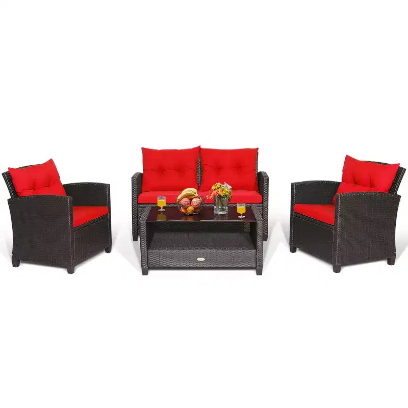 Set di mobili da giardino in rattan a 4 pezzi Costway con tavolo in vetro, scaffale e cuscini per divano
